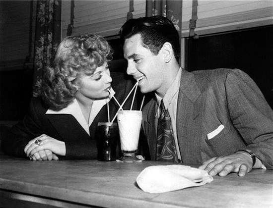 Lucy and Ricky drinking from straws