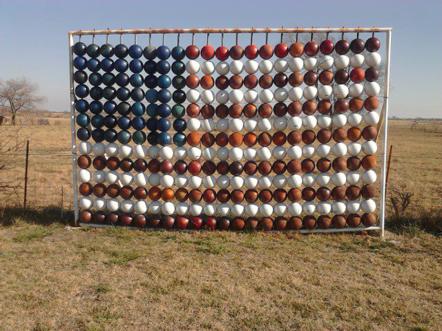 chris-barbees-bowling-ball-yard-art-flag