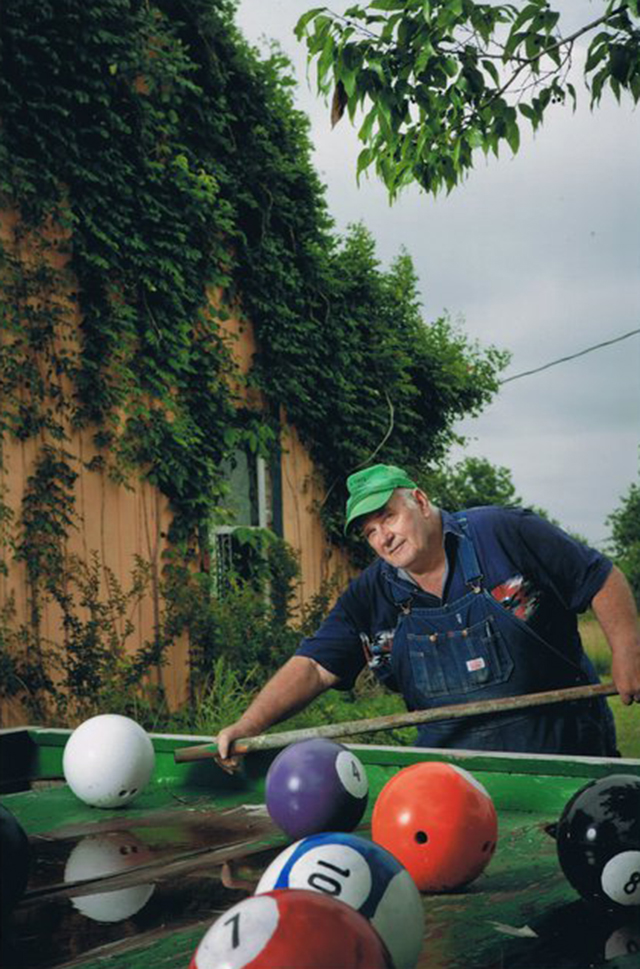 chris-barbees-bowling-ball-yard-art-playing-pool